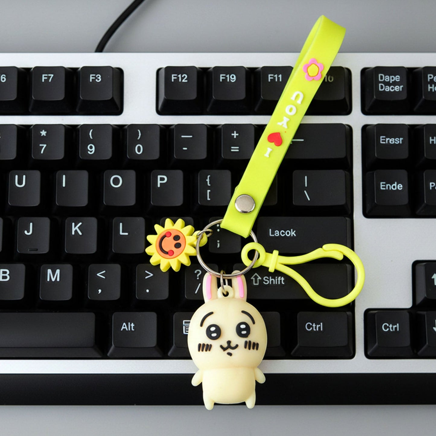 Soft silicone bunny keychain close-up showing smooth texture