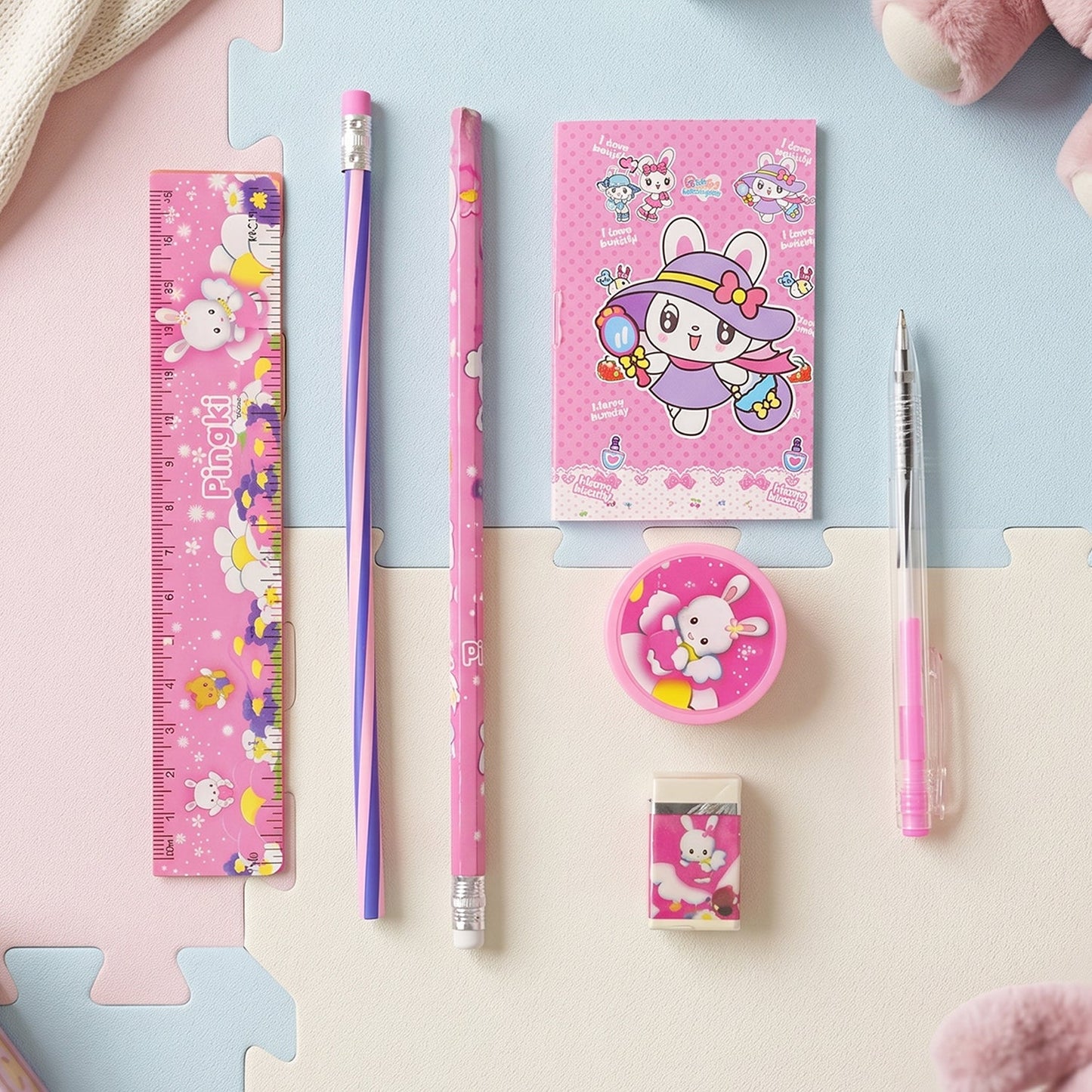 Kids study stationery kit featuring pen, sharpener, and fun character designs