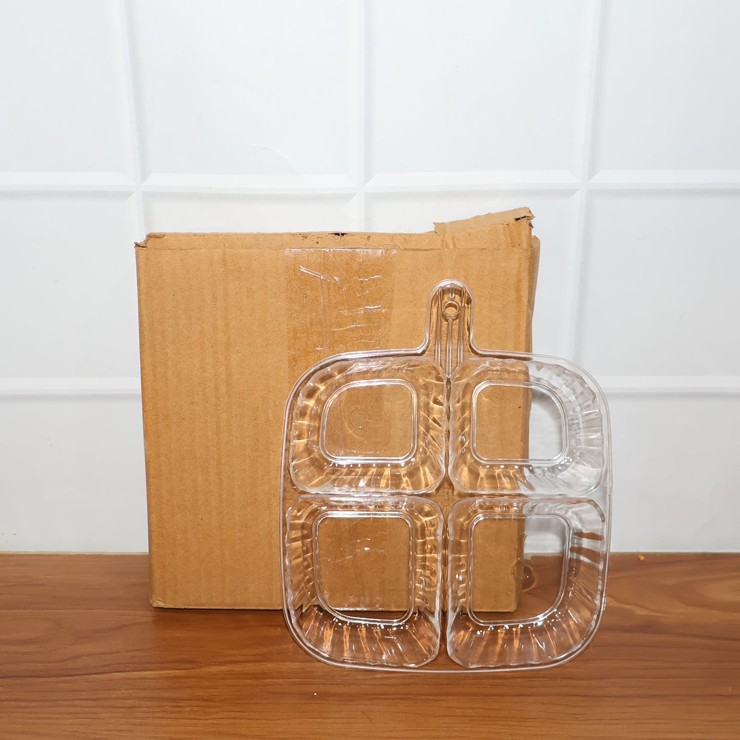 Clear plastic serving tray displayed in kitchen setting