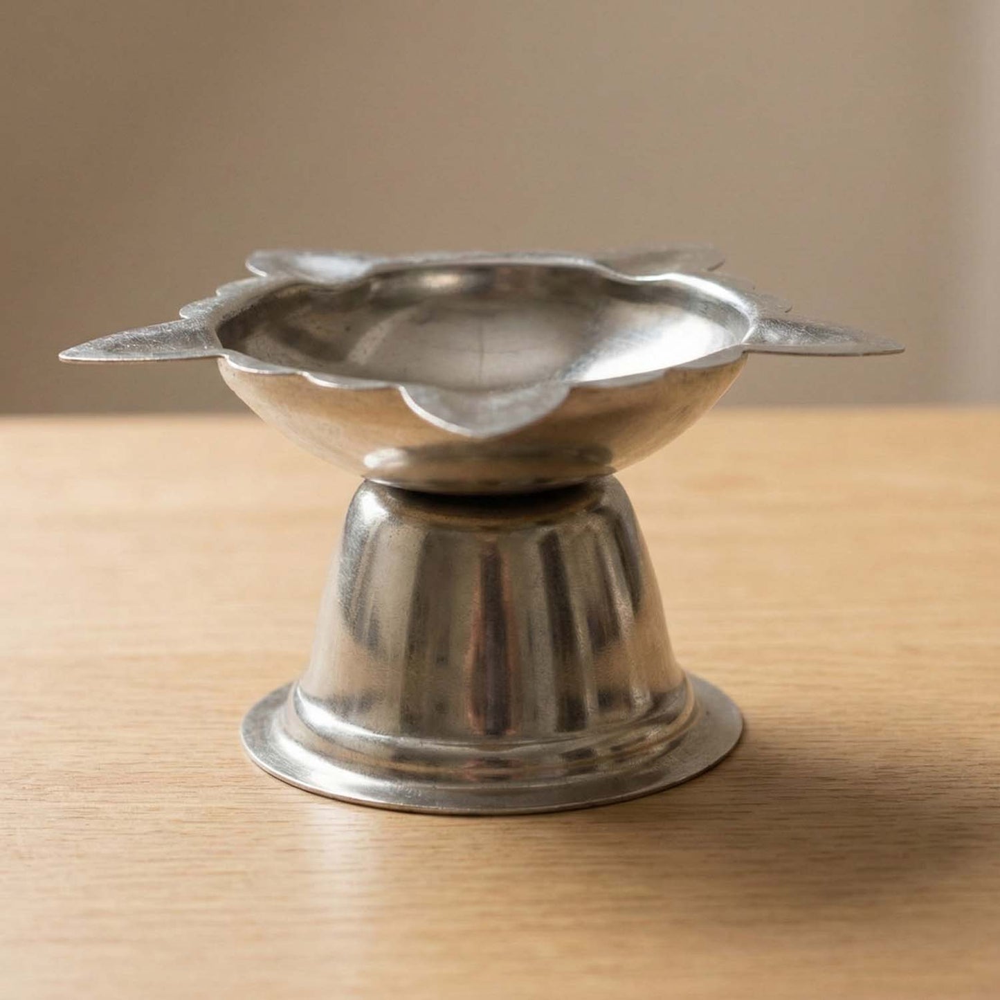 Durable and reusable steel diya holder for religious rituals