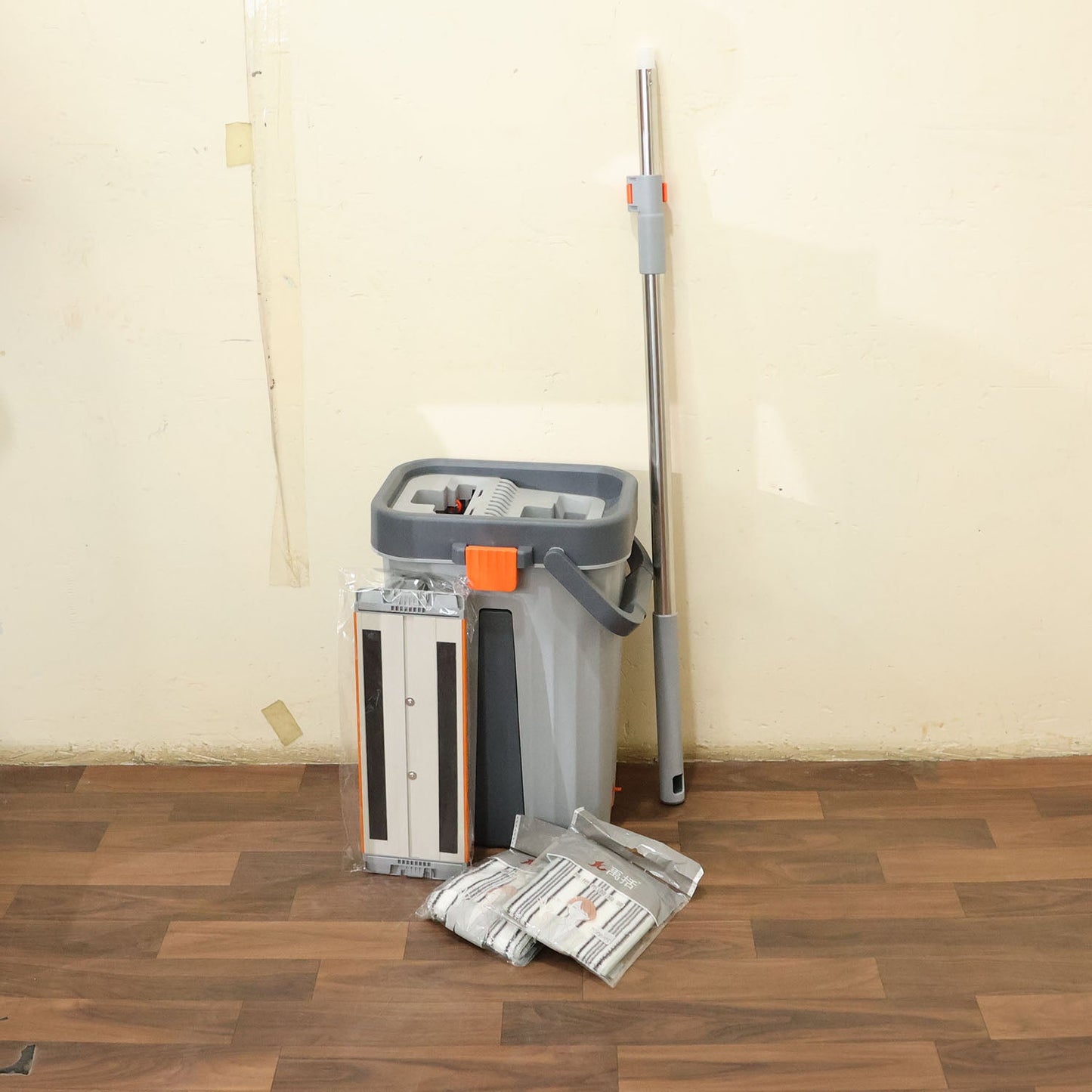Complete small flat mop bucket cleaning set in use