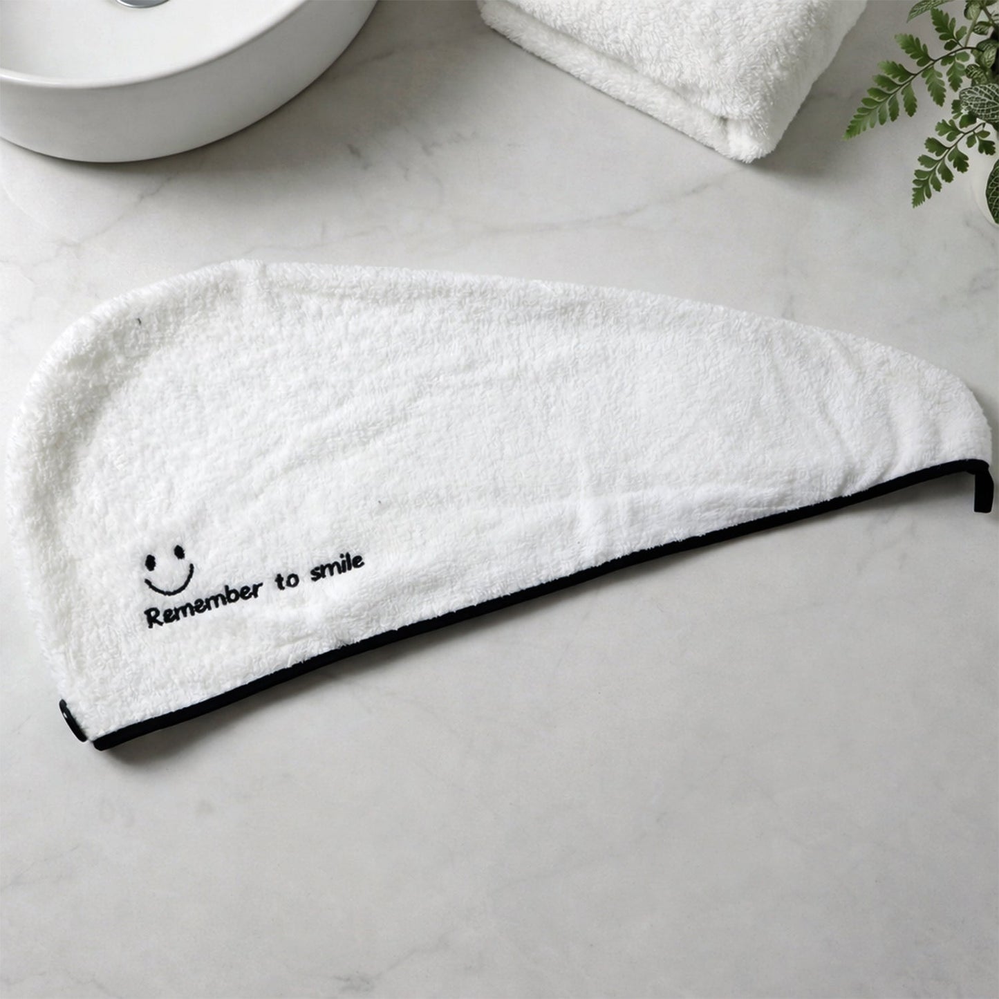 Quick dry hair wrap made of absorbent microfiber material
