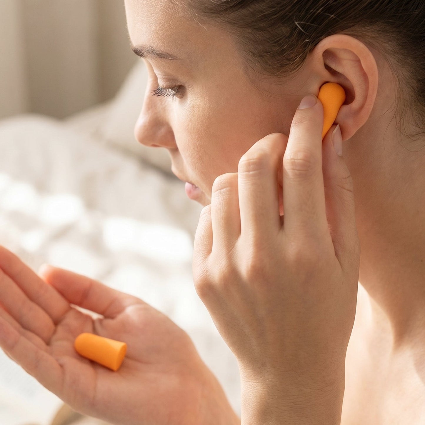 Four pairs of multi-colored soft foam earplugs for effective noise reduction