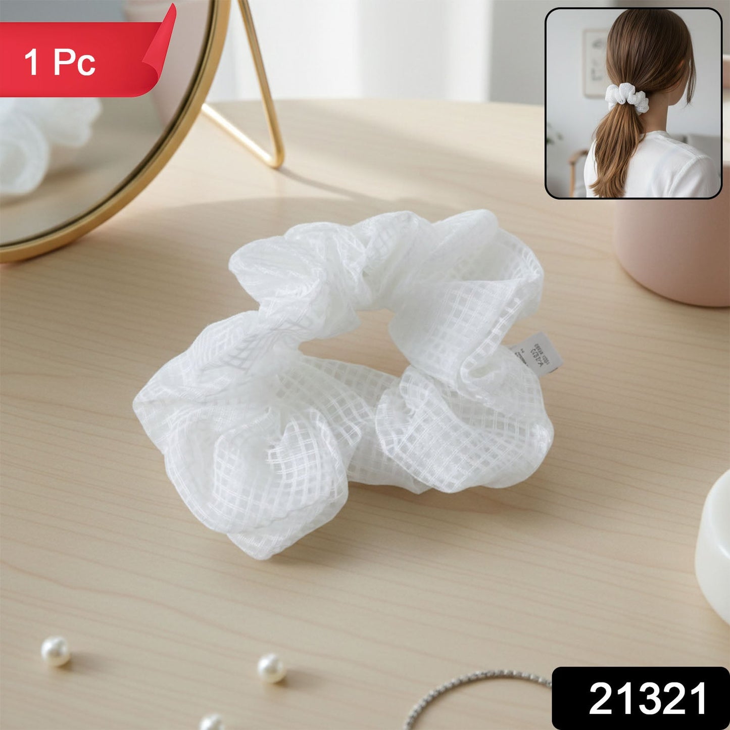 Soft stretchable white mesh fabric hair scrunchie worn in ponytail