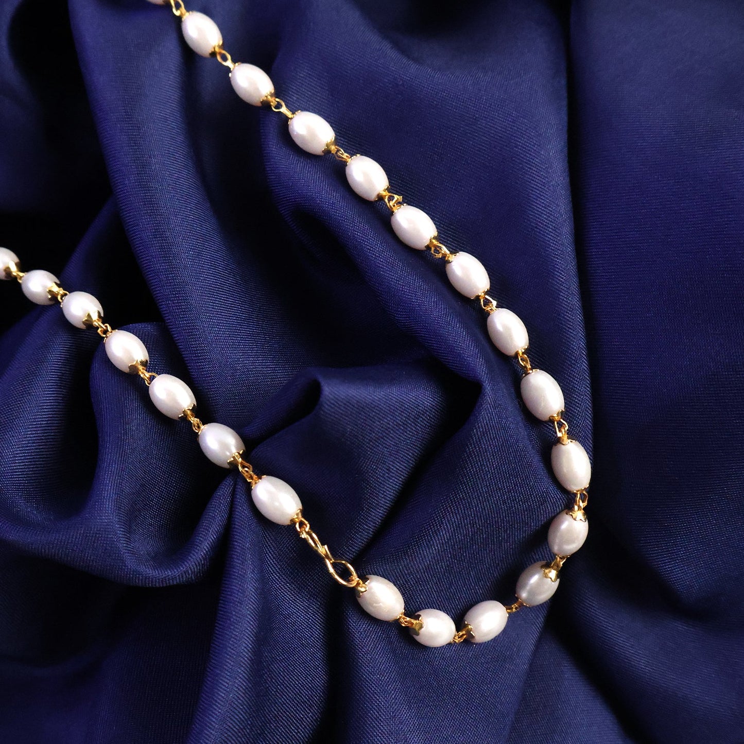 Pearl beaded chain necklace with gold accents