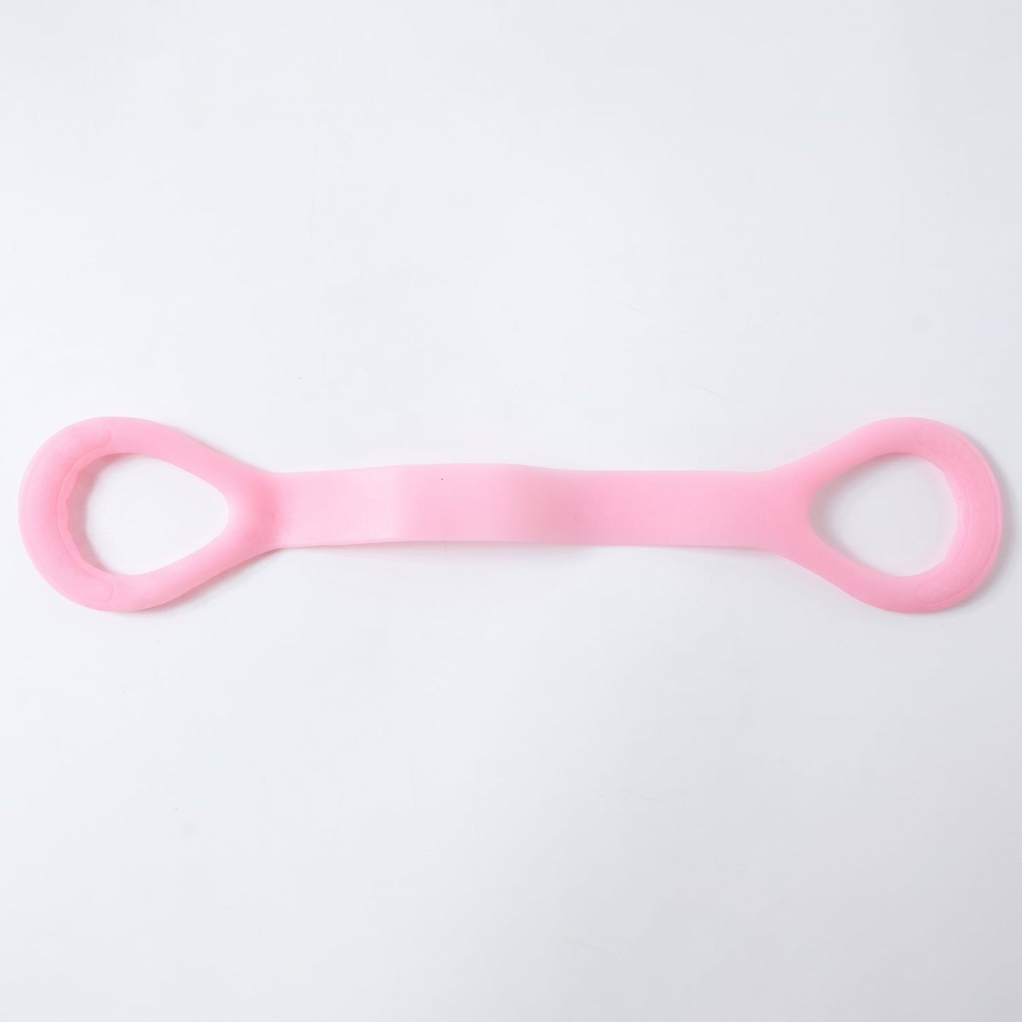 Woman using resistance band for arm exercises during workout