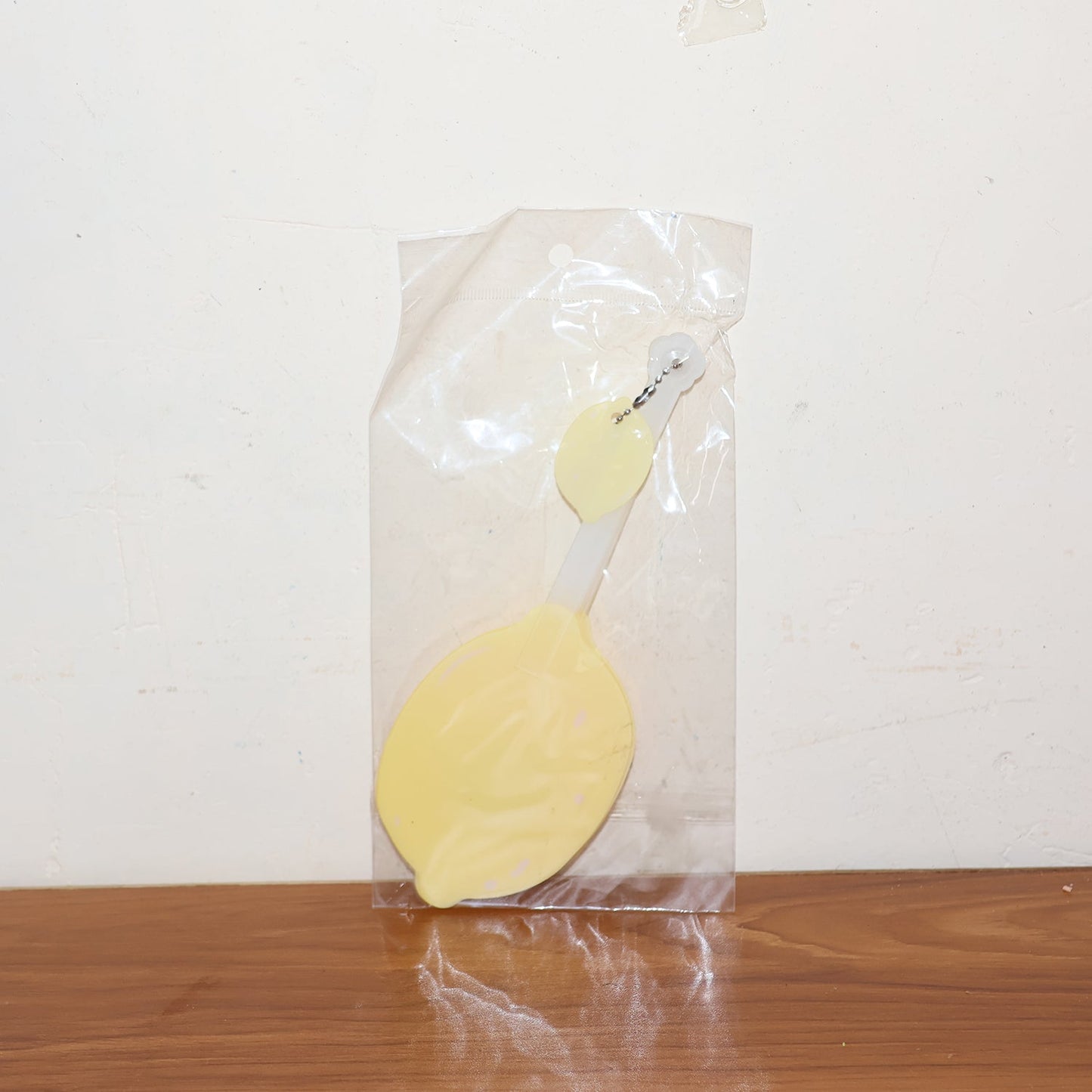 Lemon-shaped hand fan providing instant manual cooling and comfort