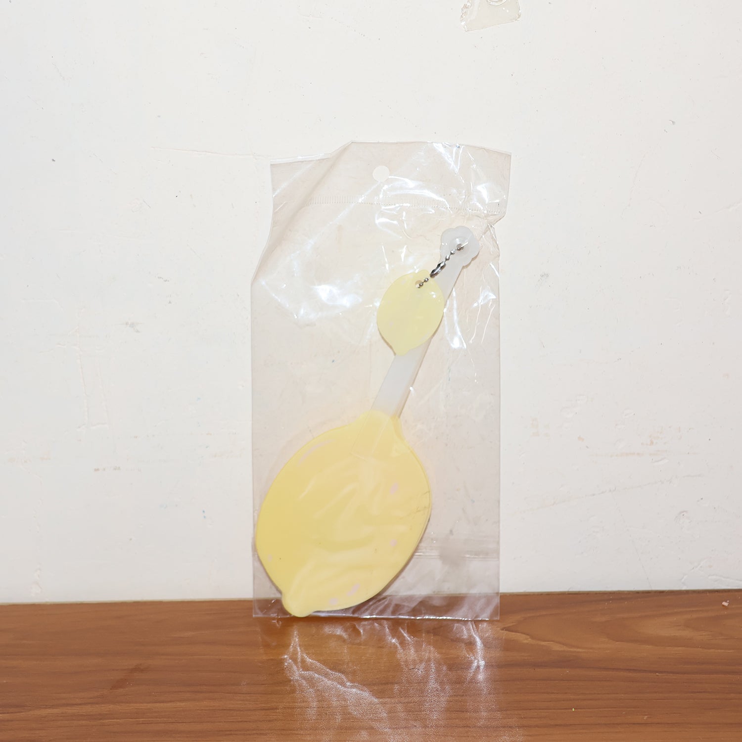 Lemon-shaped hand fan providing instant manual cooling and comfort