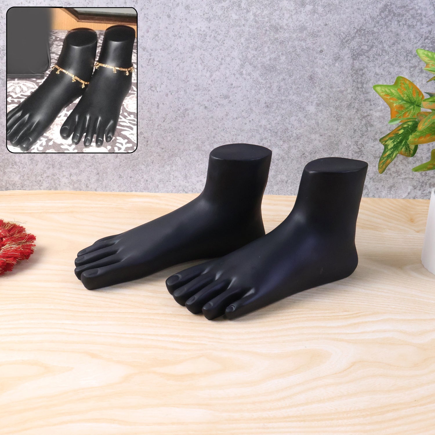 Close-up of premium black foot mannequin display stand highlighting anklets and payal