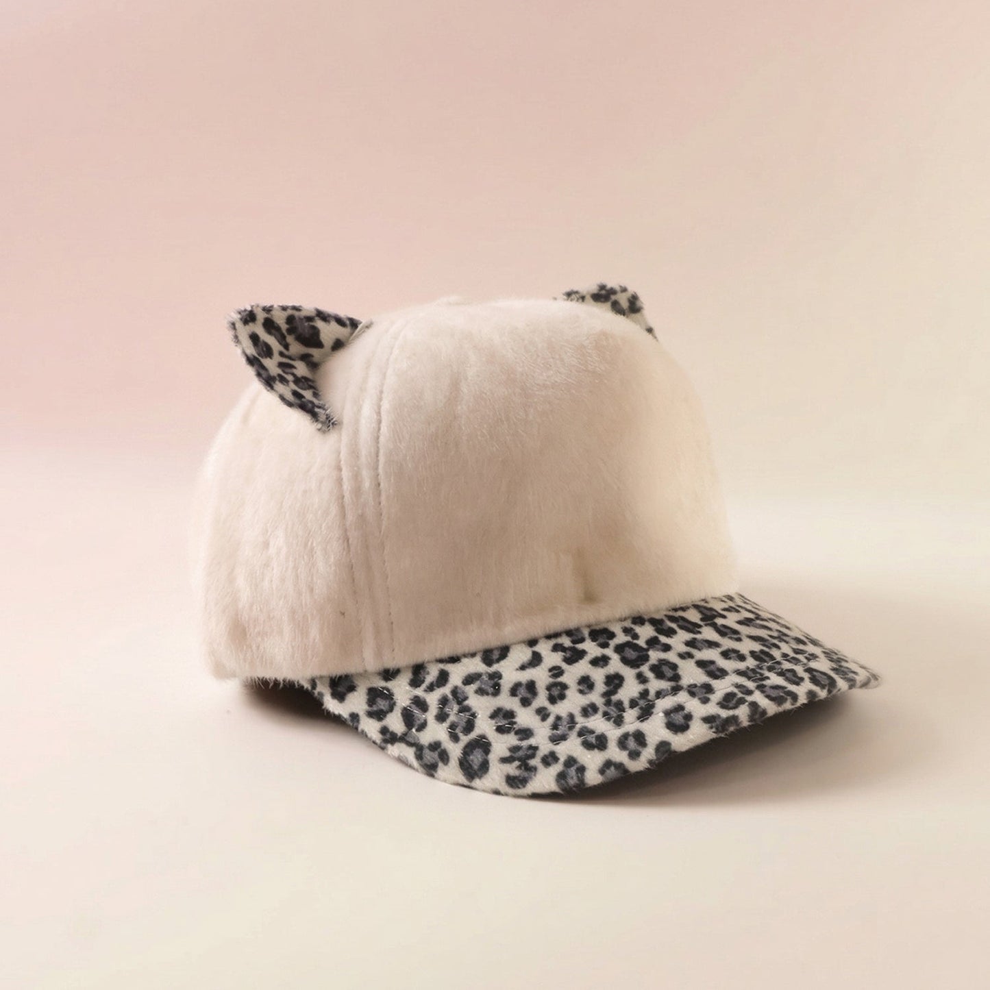 Cap with cat ears and printed visor, outdoor winter fashion