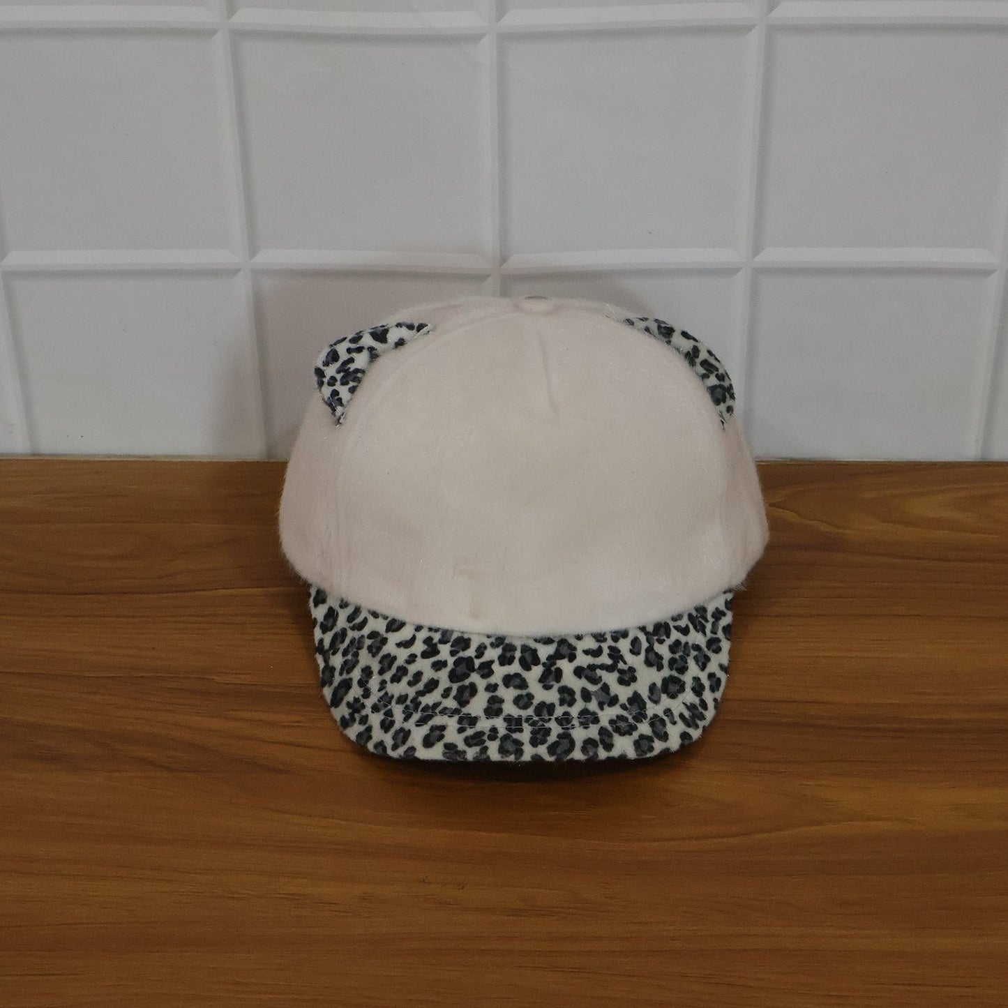 Outdoor shot of cat ear cap worn with winter clothing