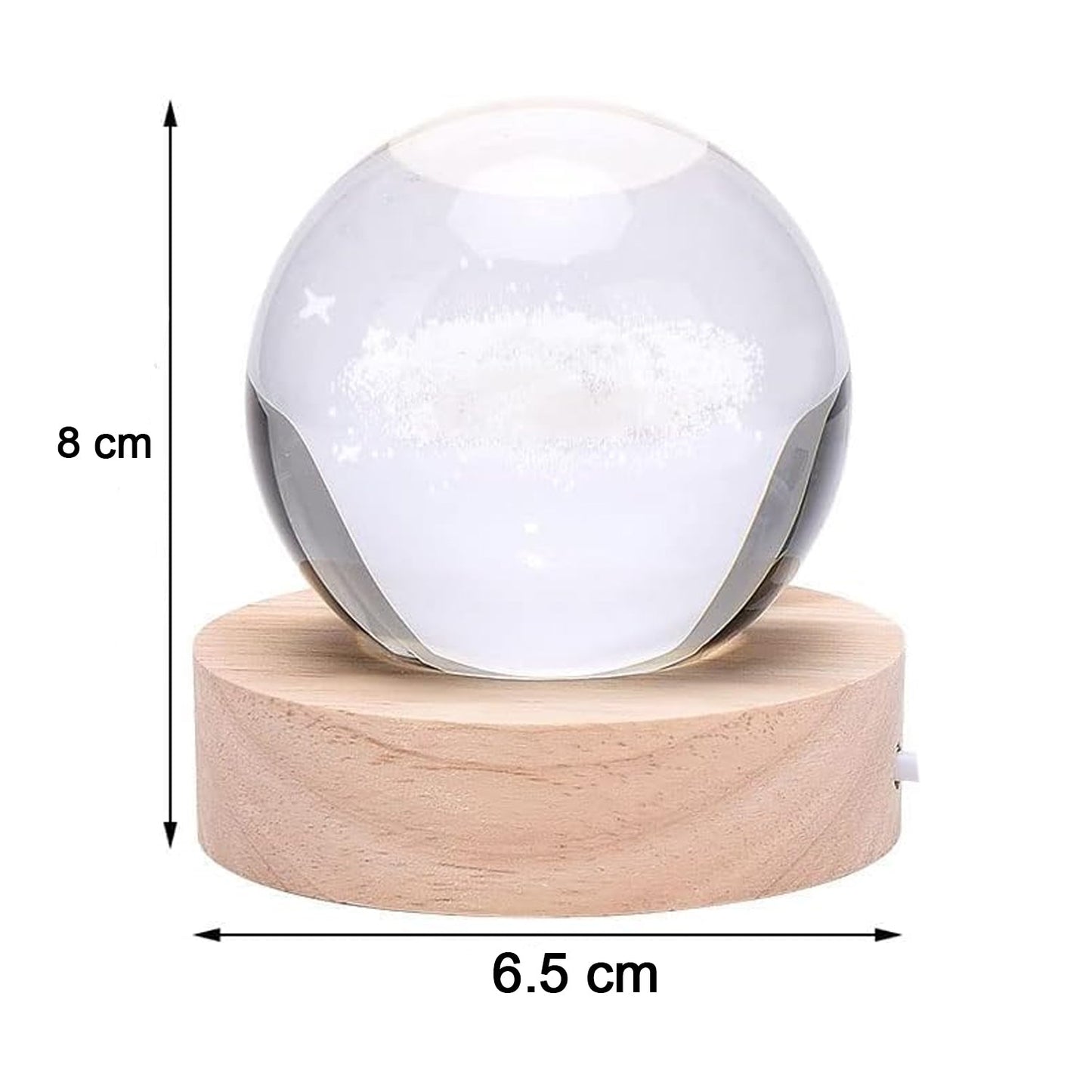 Hand holding the crystal ball lamp to show its compact size and portability.