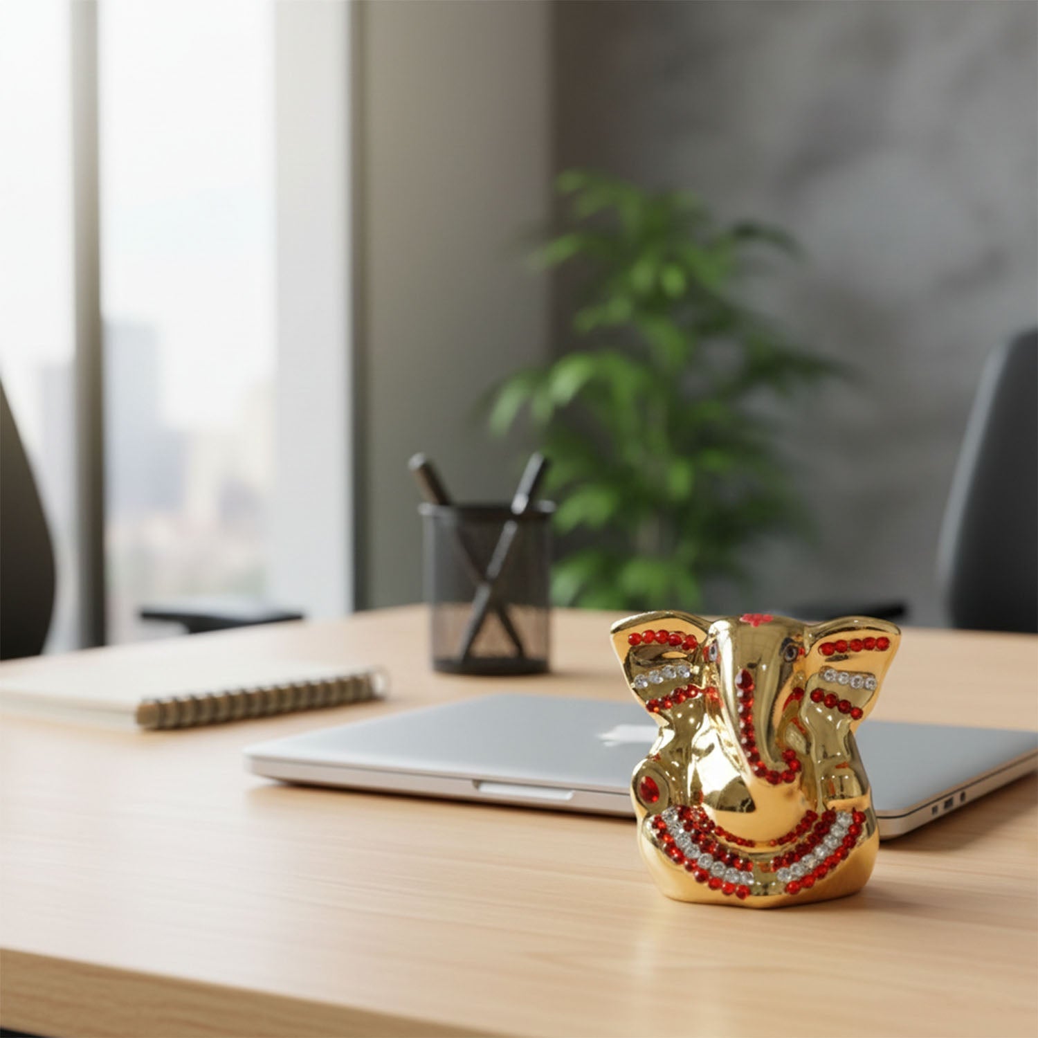 Spiritual home décor showpiece with golden tones and stone embellishments