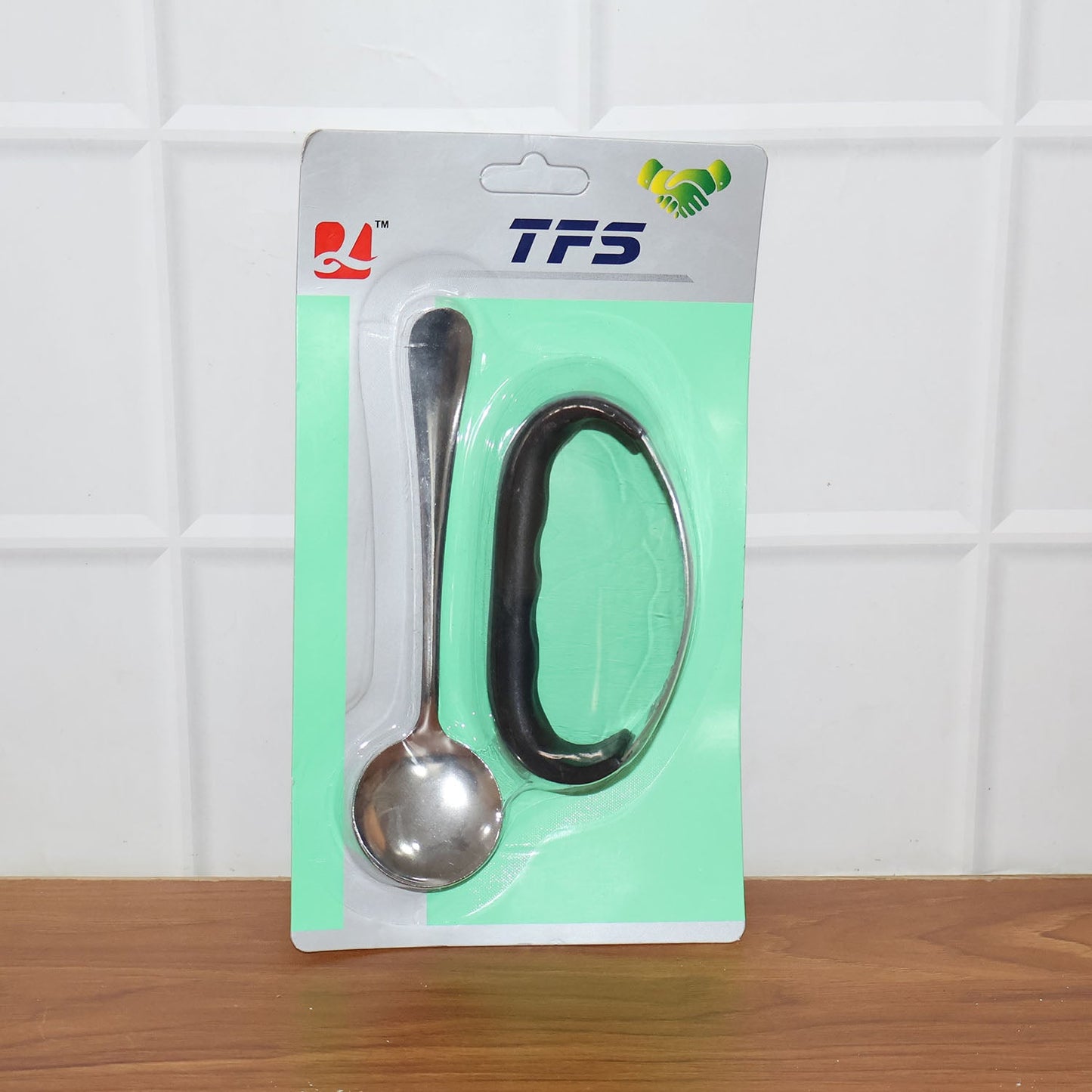 Heavy-duty garlic press tool in use during food preparation