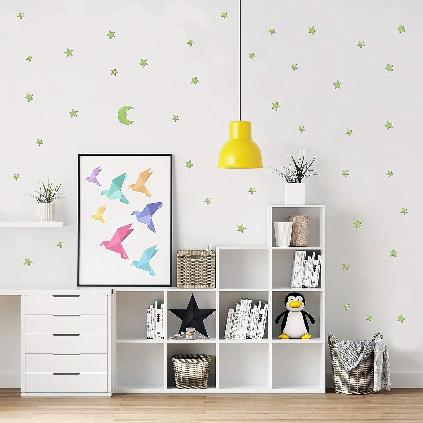 Fluorescent star and moon stickers glowing brightly at night, bringing the wonders of the cosmos indoors.
