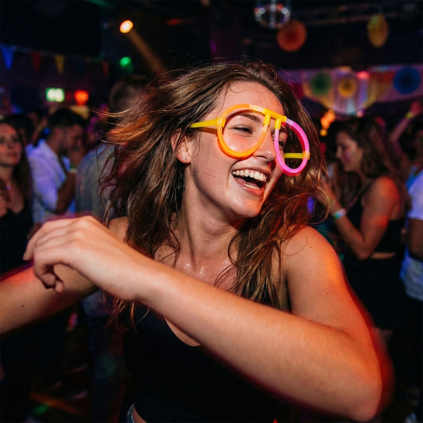 Glow party glasses displaying colorful neon tubes