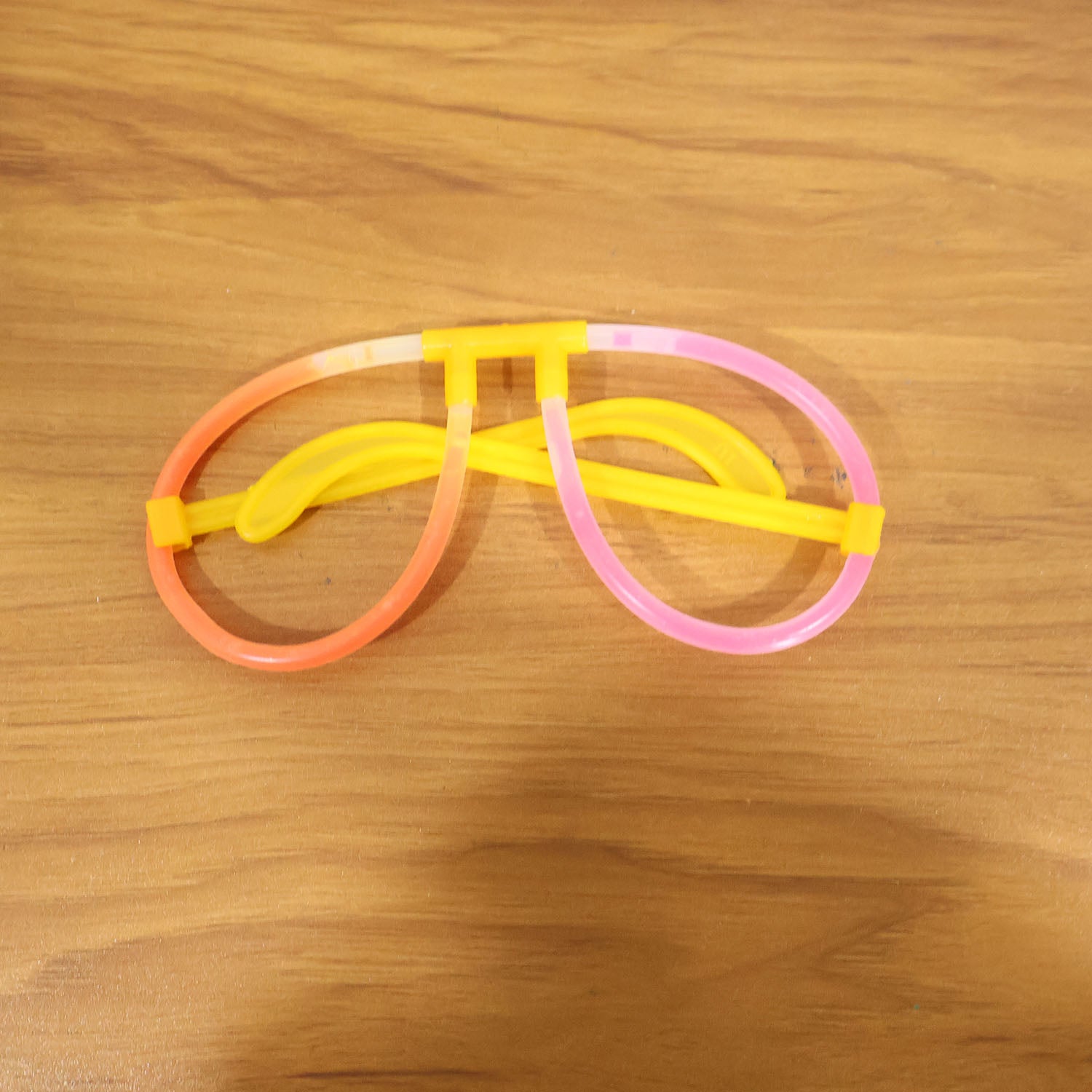 Live event with partygoers wearing glowing neon glasses