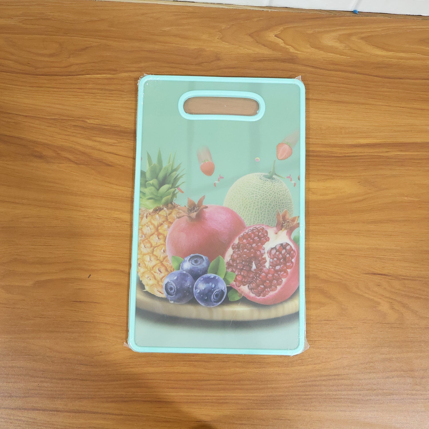 Green cutting board in kitchen setting