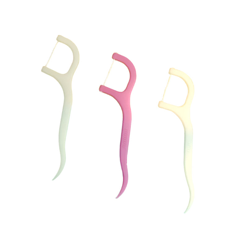 Portable MintGuard floss picks ensuring fresh breath on the go.