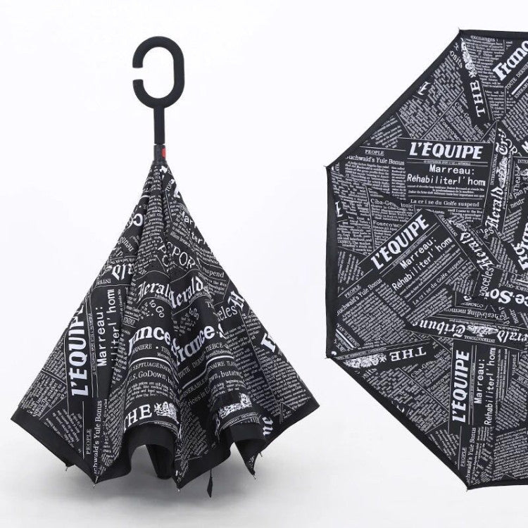 Vibrant printed canopy of the windproof reverse umbrella, showcasing its design.
