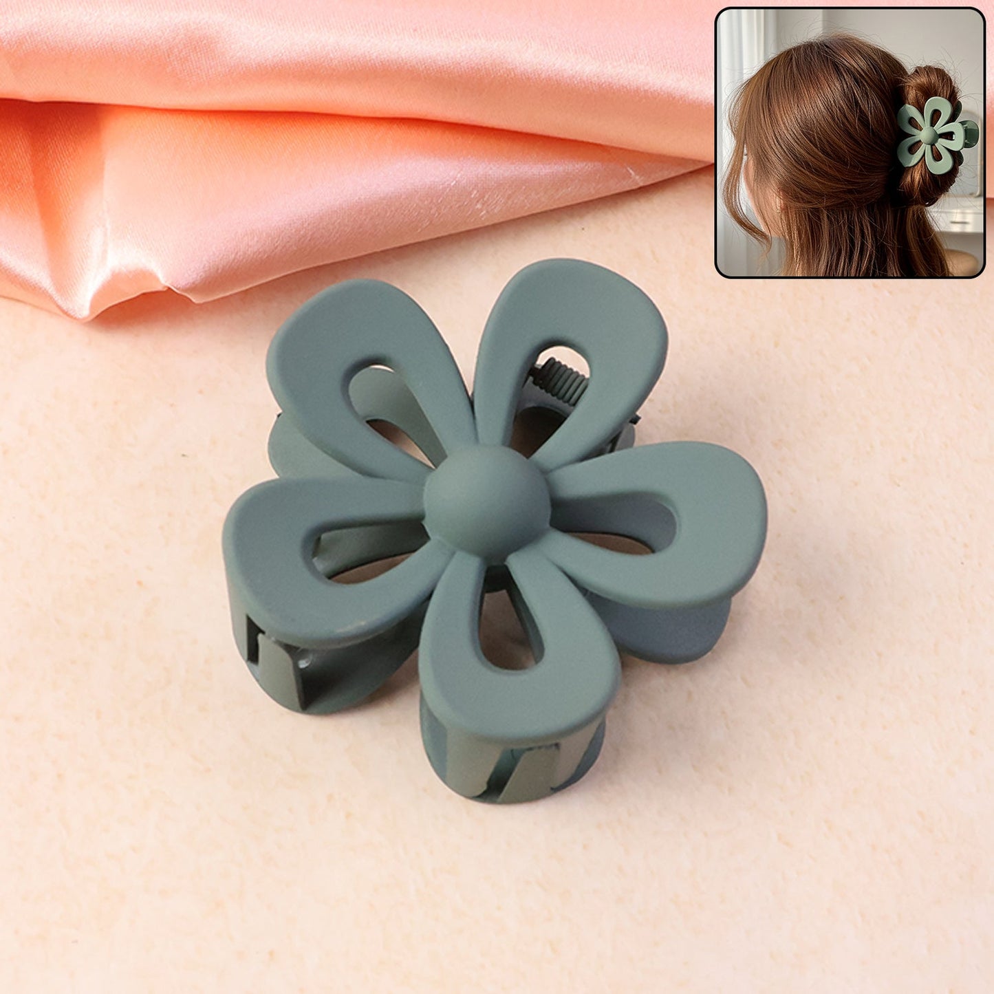 Flower shaped hair claw clip featuring a decorative floral design