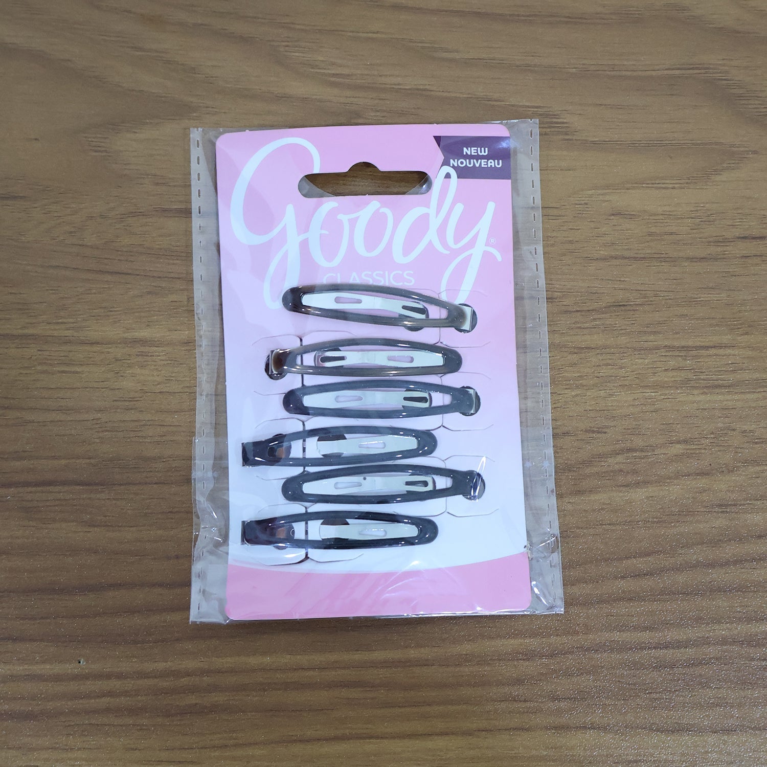 Model wearing snap hair clips styled in wavy hair