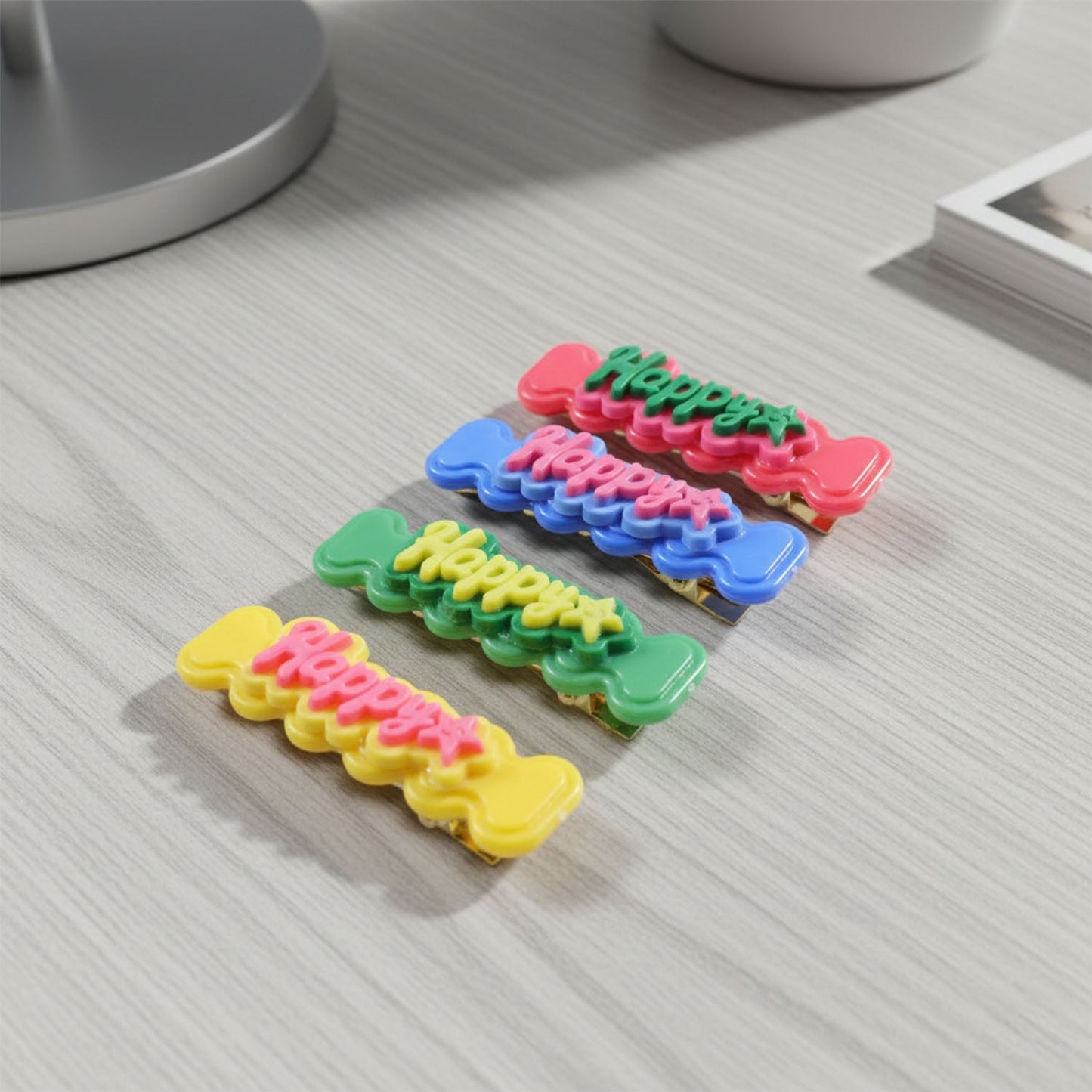 Close-up view of happy bone hair clips highlighting colorful, fun details