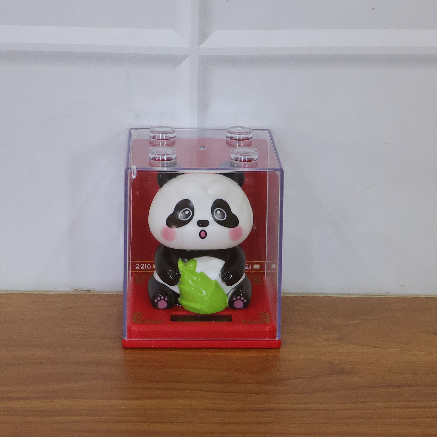 Small animated solar powered panda ornament with movement