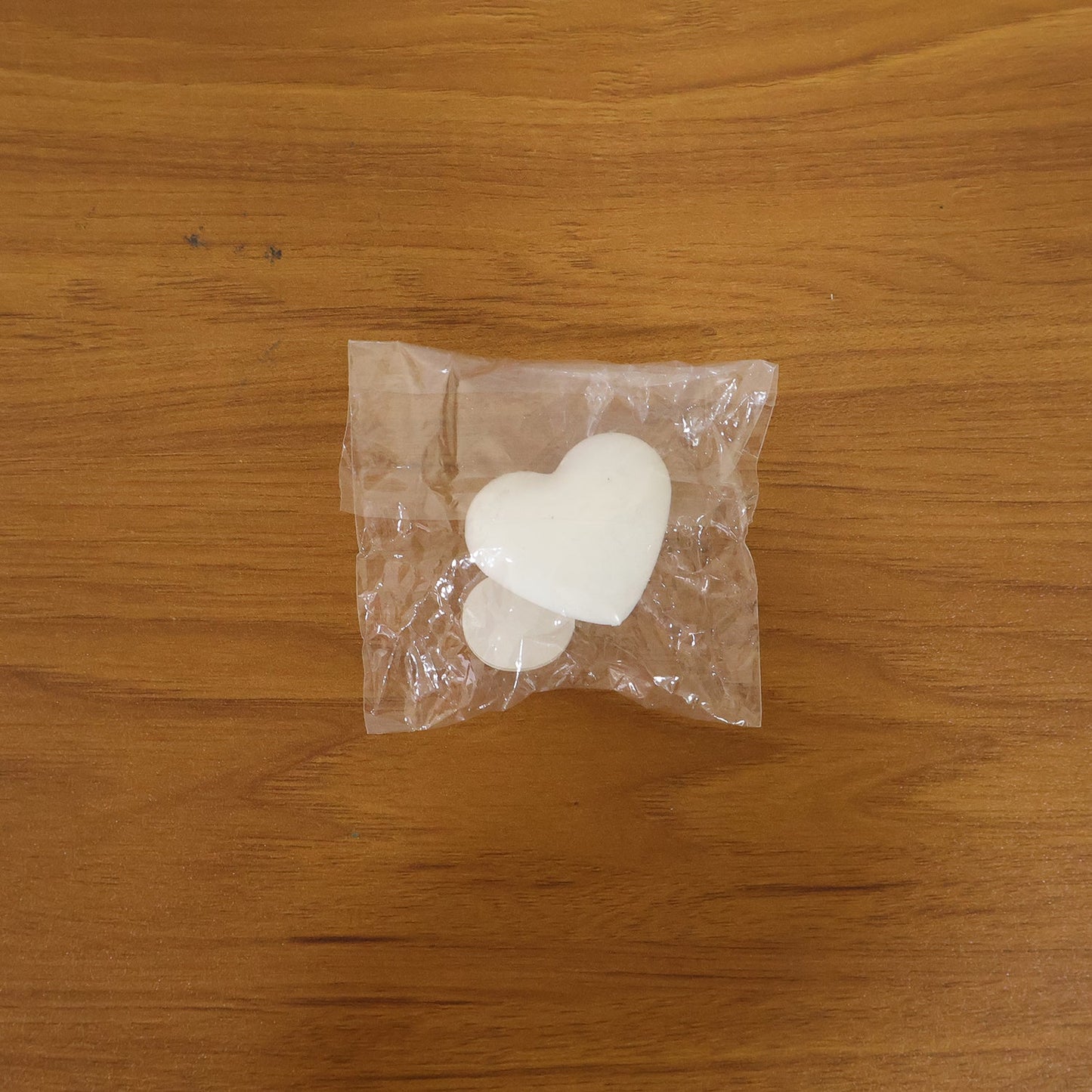 Bathroom flush control button with heart shape design
