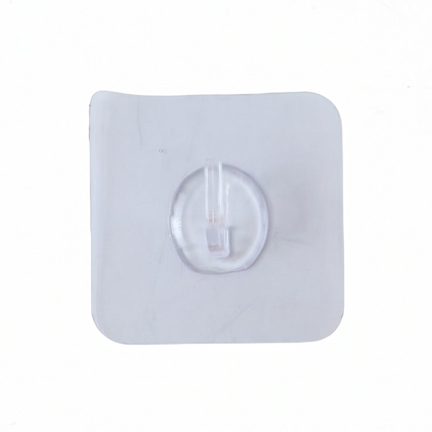 Plastic adhesive wall hook on wardrobe surface