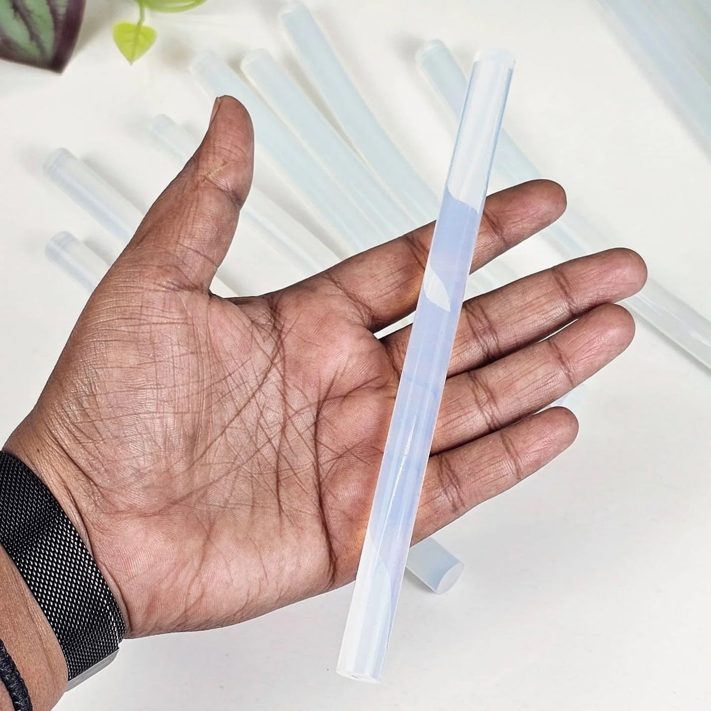 Transparent glue stick providing strong adhesion for various surfaces