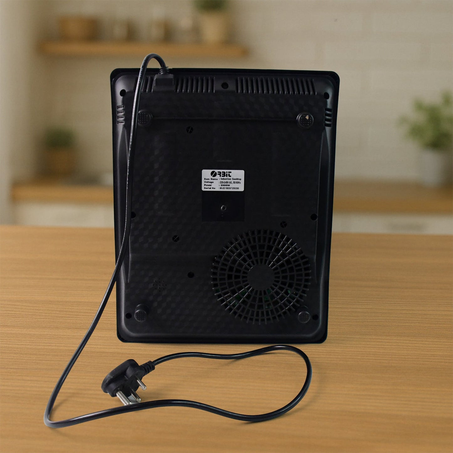 Orbit induction cooker with power cable attached