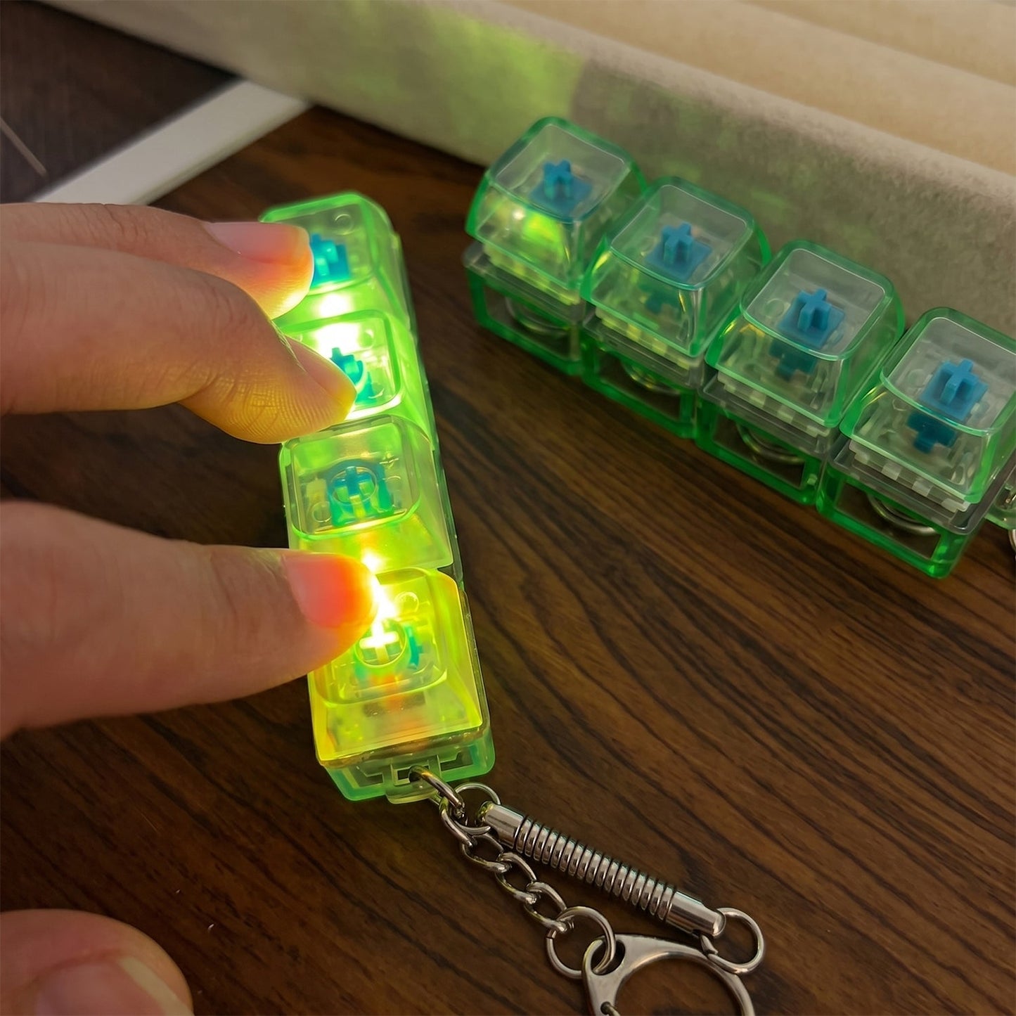 Desk-friendly mechanical switch fidget keychain gadget