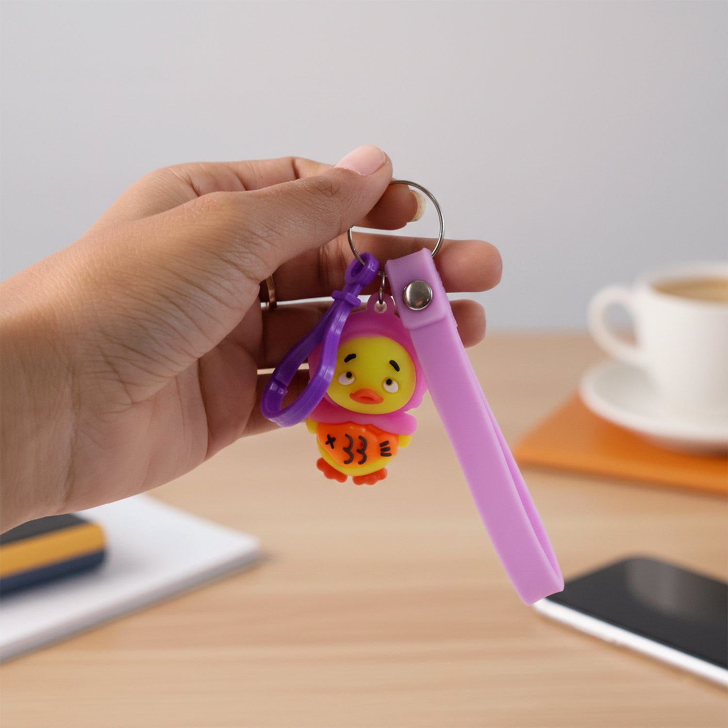 Adorable cartoon duck figure keychain with soft strap and metal clip
