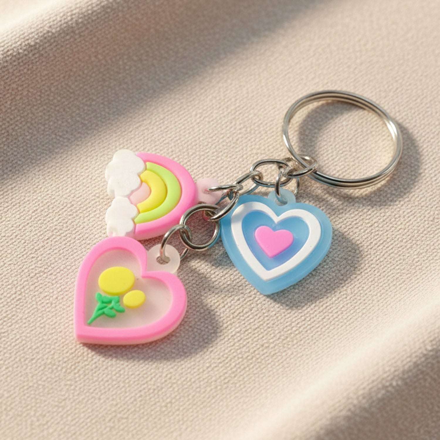 Heart and rainbow decorative charm keychain close up