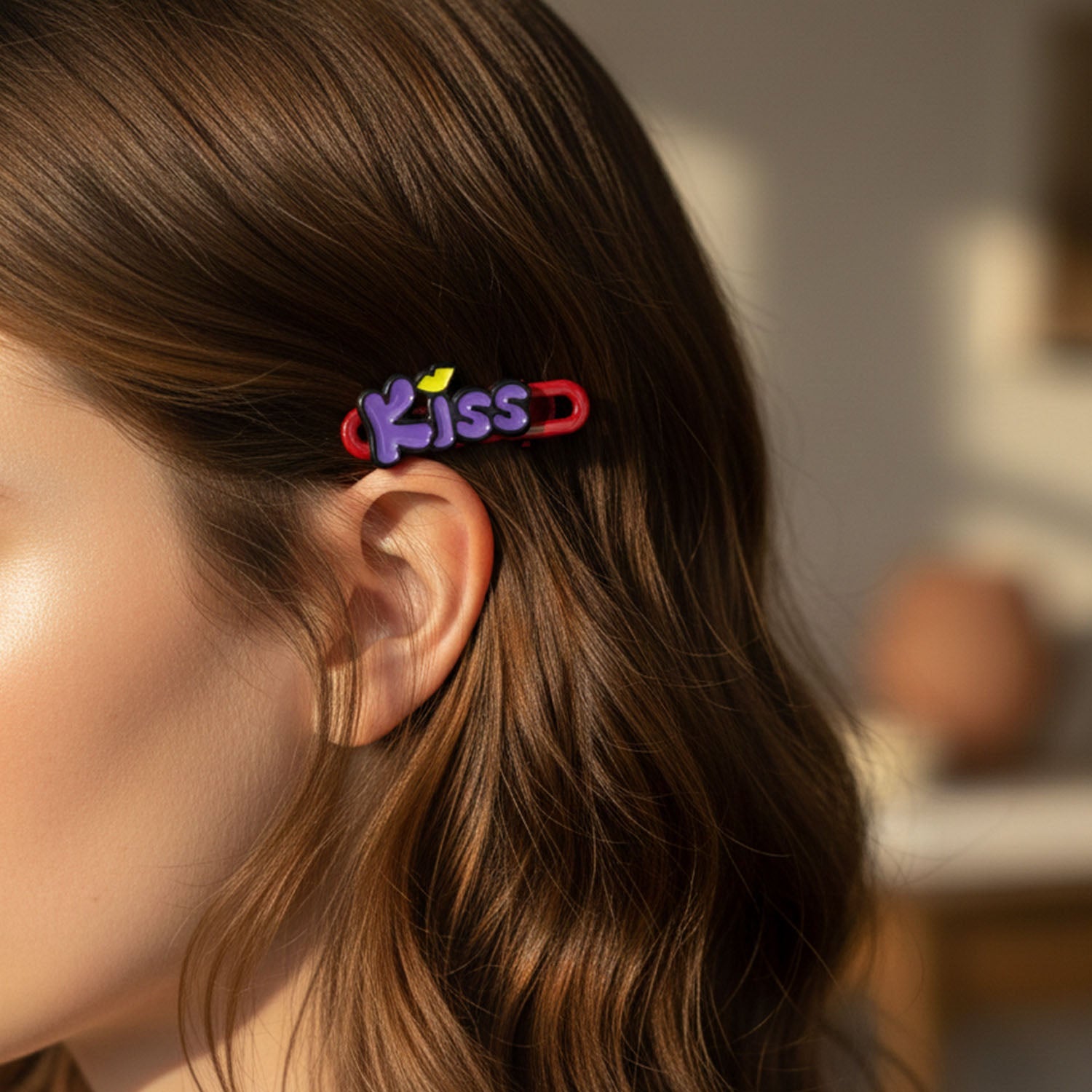 Two Kiss hair clips styled in long brown hair for fashion