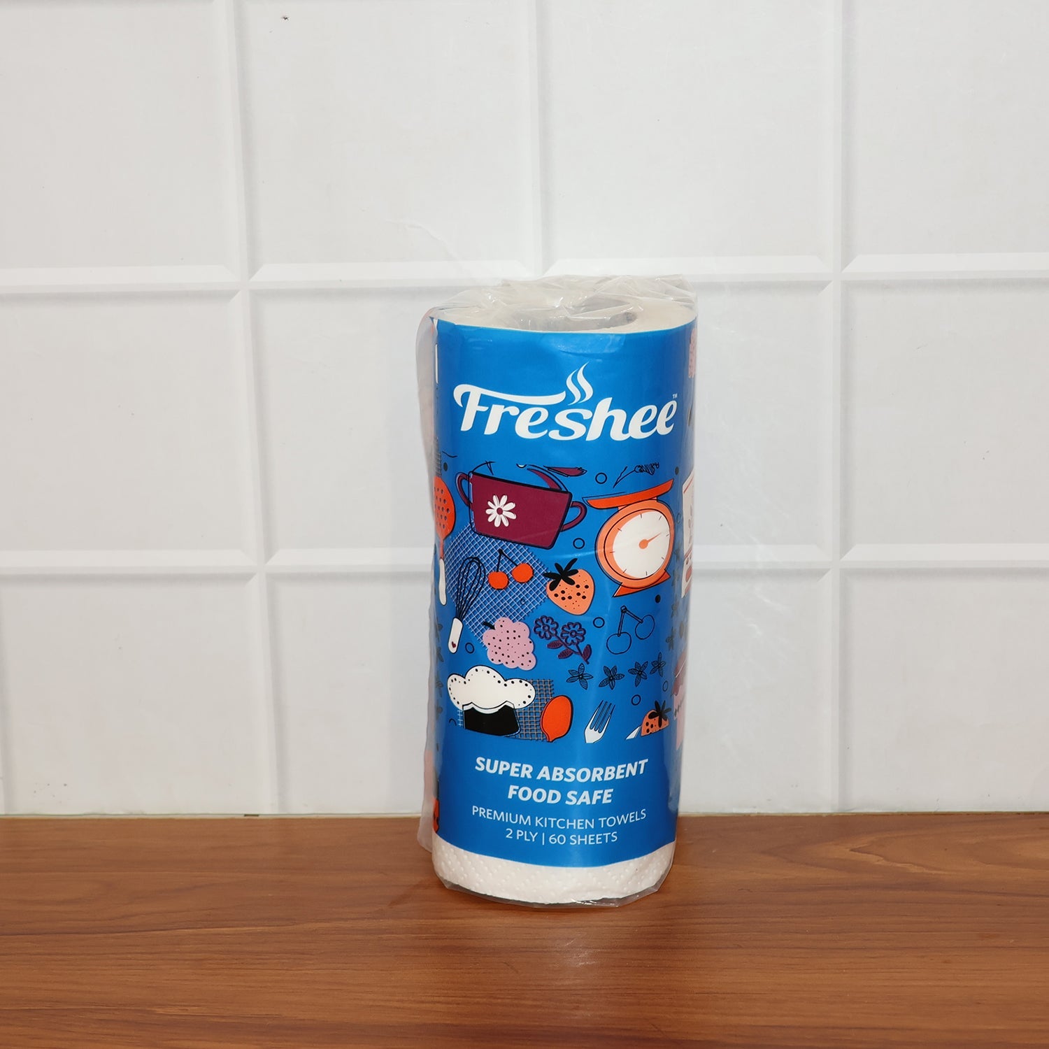 Clean roll of kitchen paper towels with no branding visible