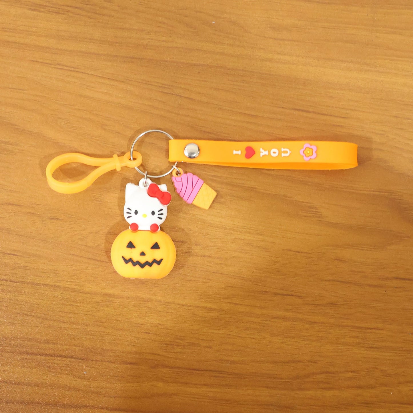 Stylish kitty pumpkin accessory as keychain or bag charm