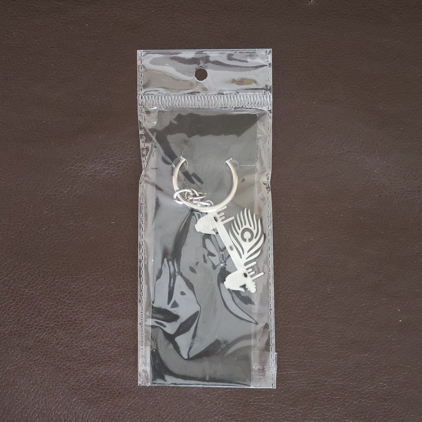 Krishna Flute Keychain displayed in a lifestyle setting, perfect for daily use.