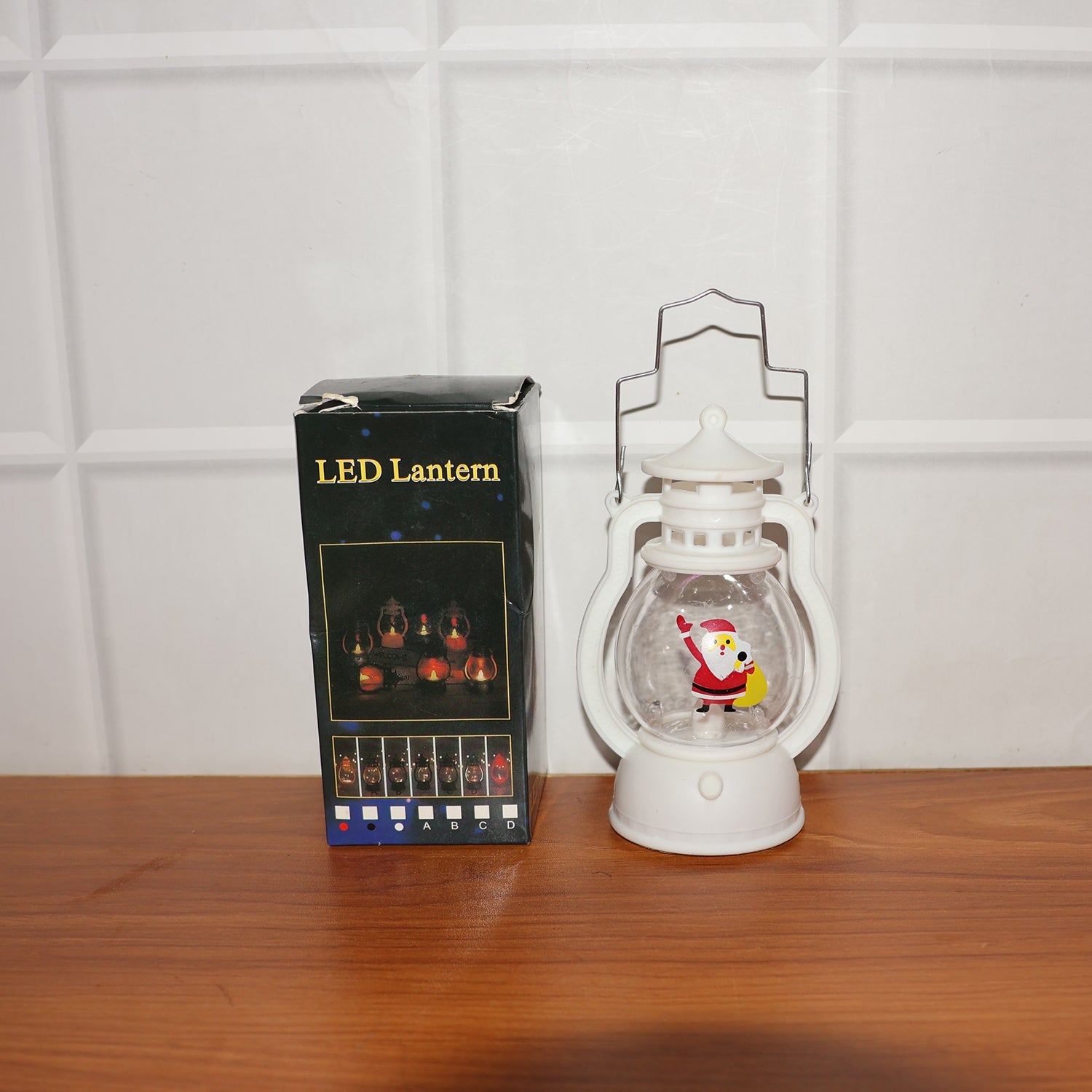 Santa LED lantern displayed in a festive holiday setting.