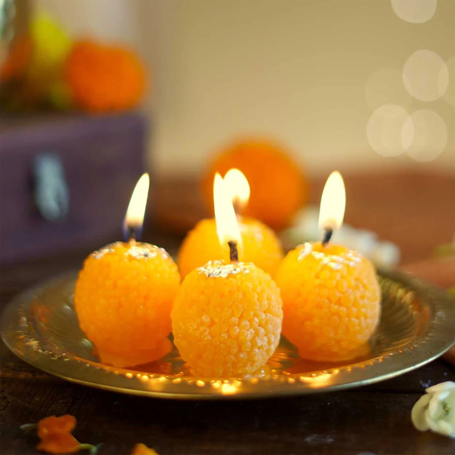 Close-up of laddu shaped wax candle showing detailed craftsmanship