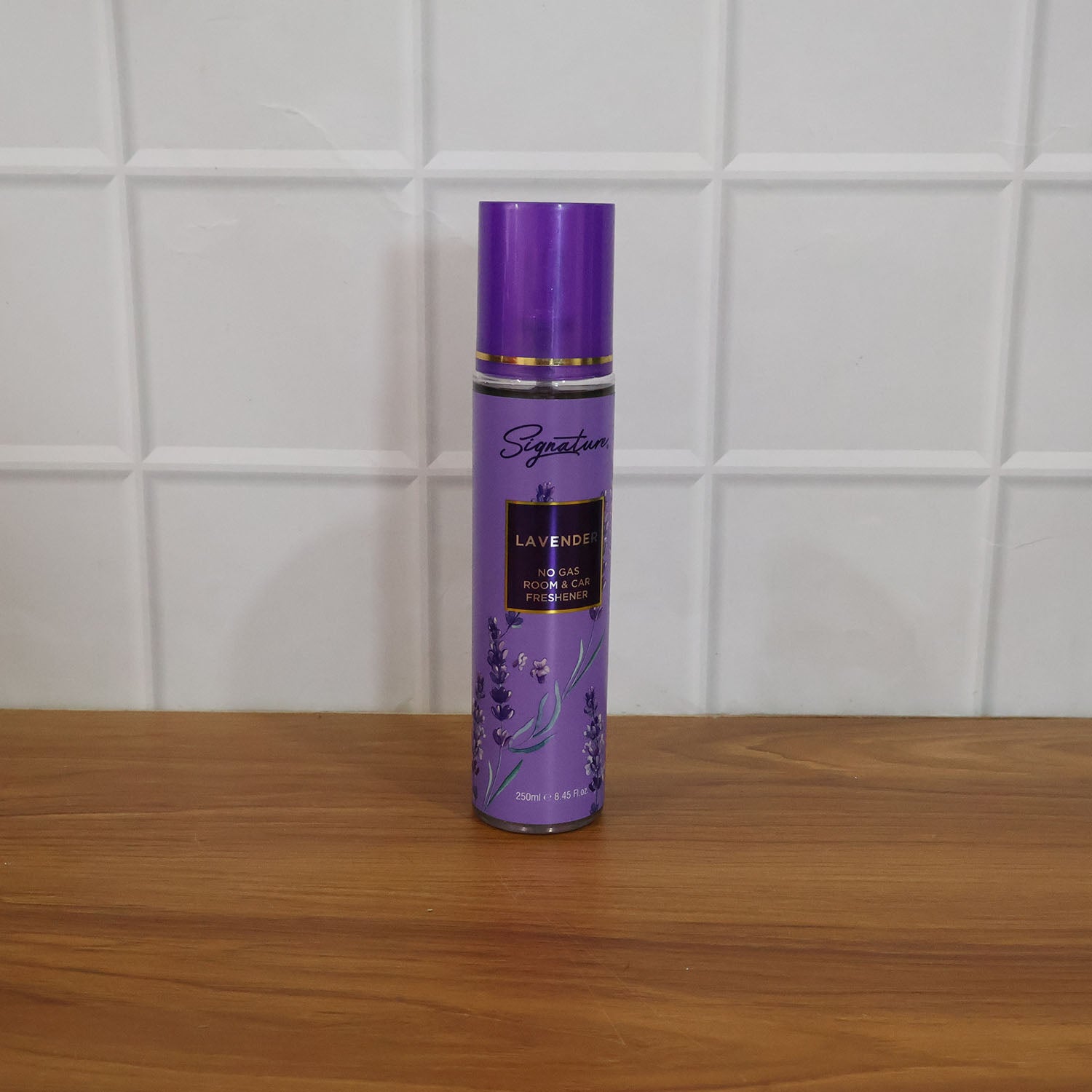 Elegant Signature lavender air freshener spray bottle designed for easy use