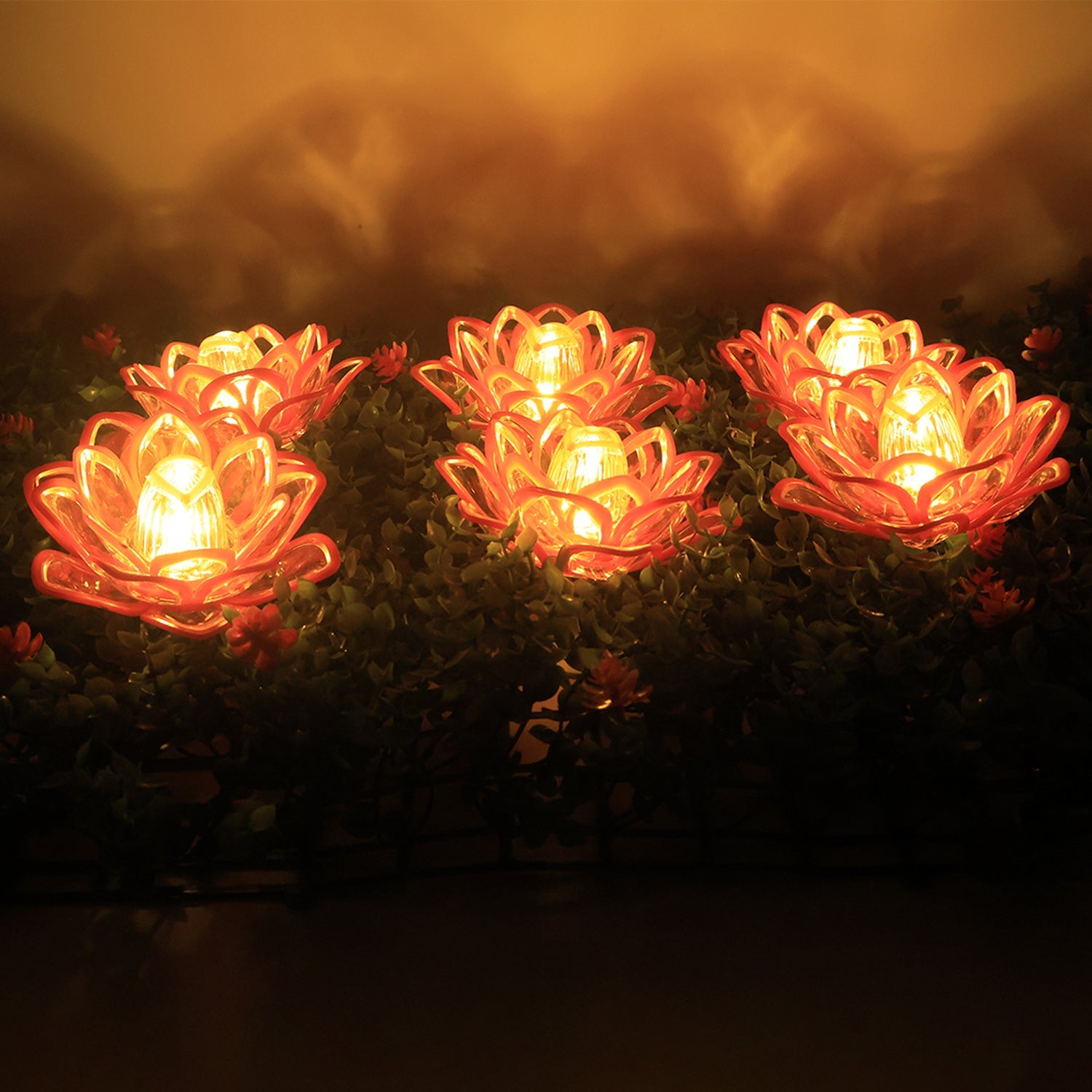Close-up of lotus flower design LED flameless decorative candle with warm glow