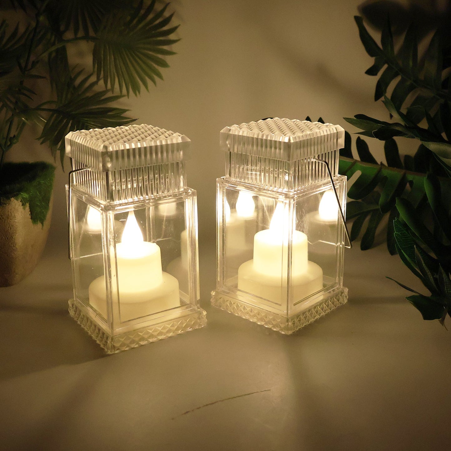 Battery operated LED flameless lantern candles lit in dark room
