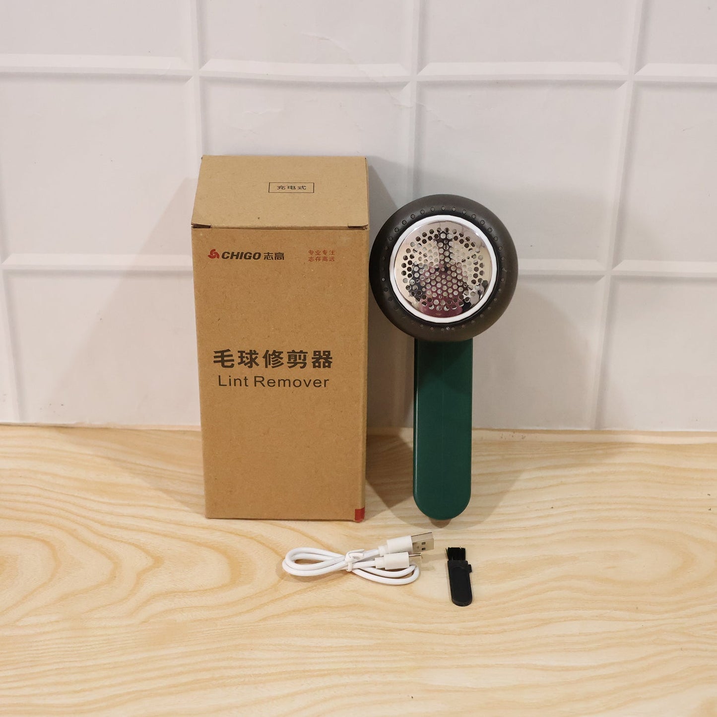 Portable lint remover in use