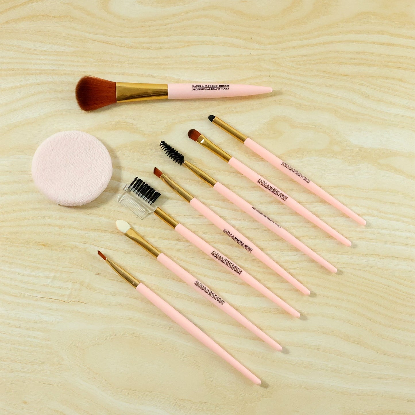 Complete range of makeup brushes arranged for a full beauty routine