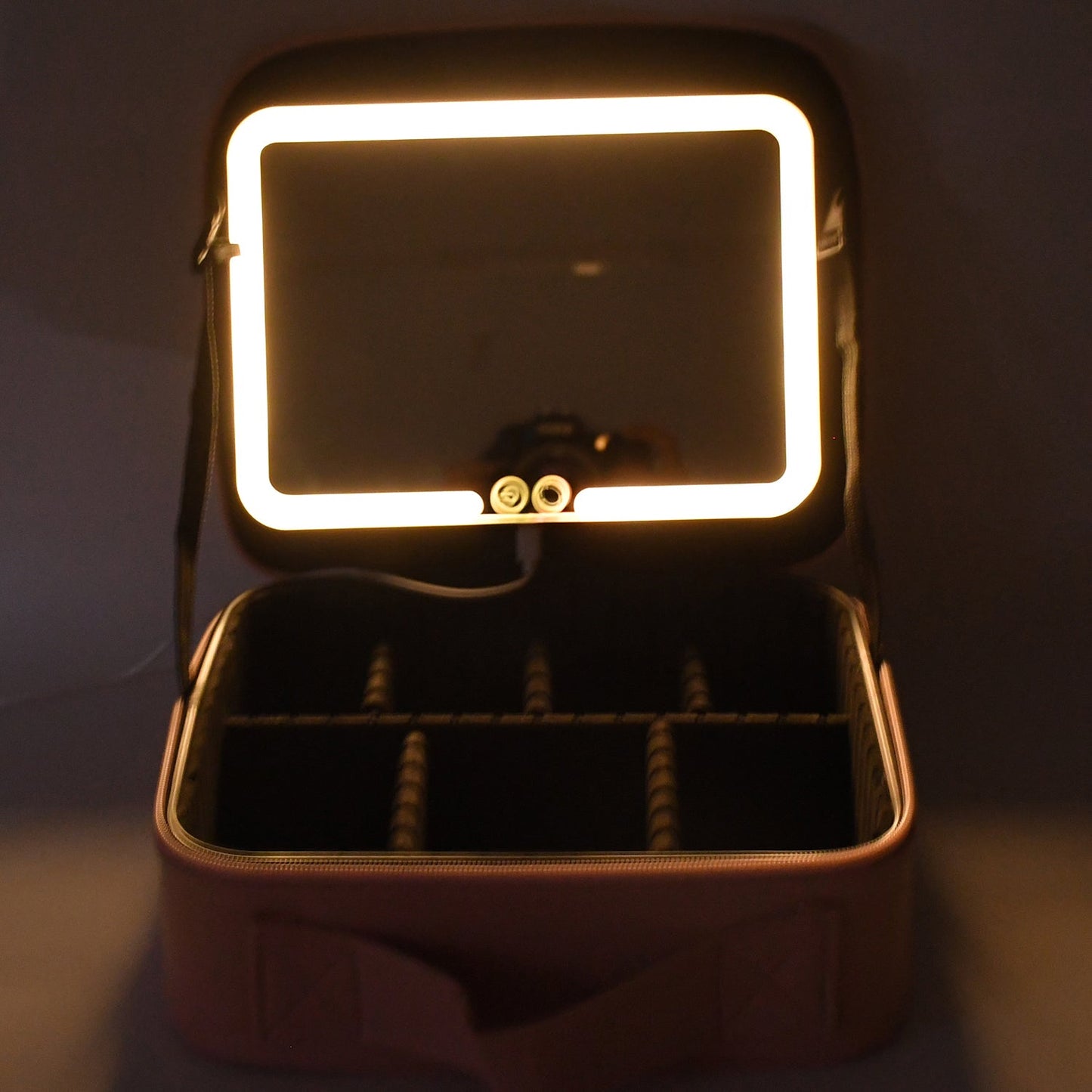 Pink LED light makeup organizer box with organized cosmetic storage
