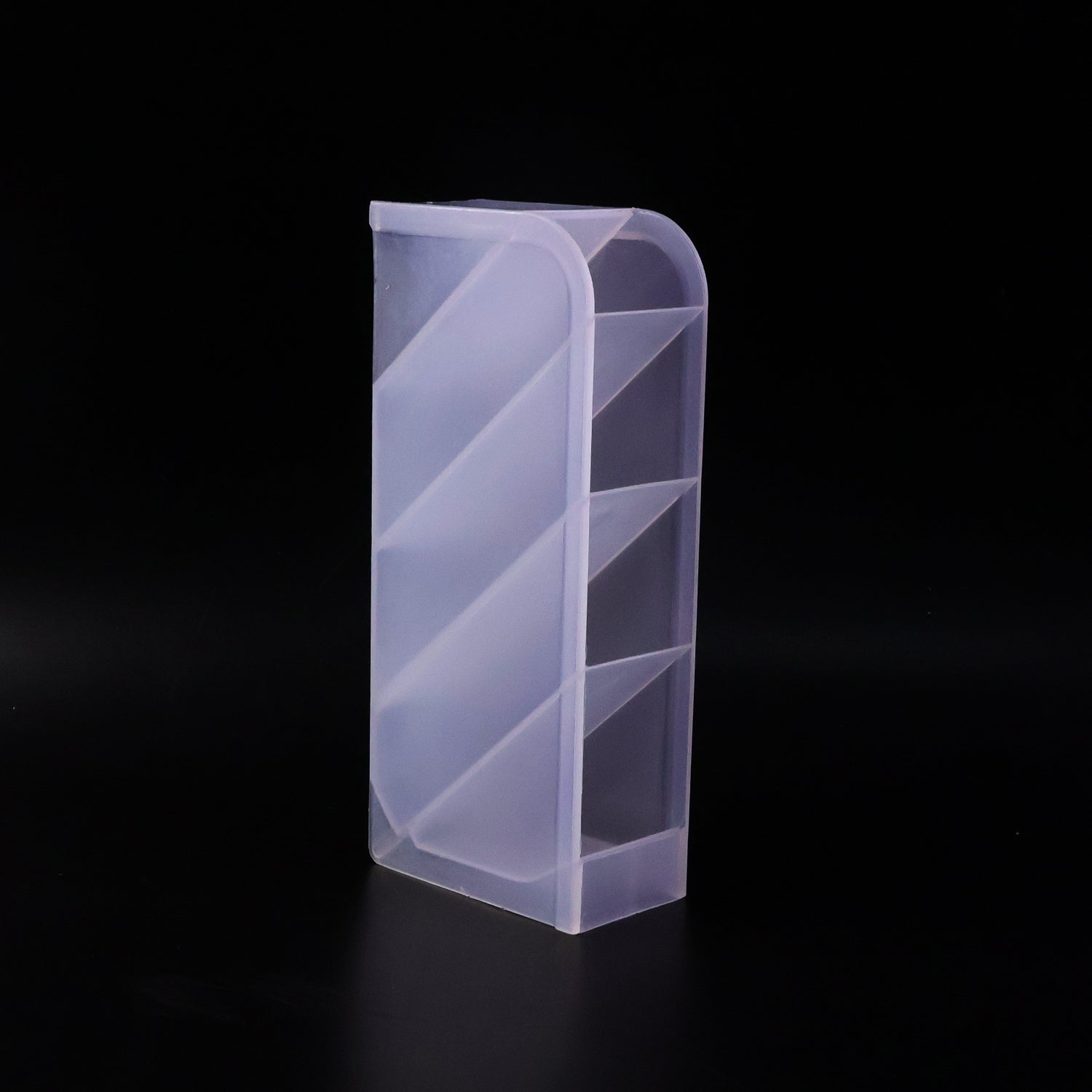 Close-up of plastic multi-storage holder compartments