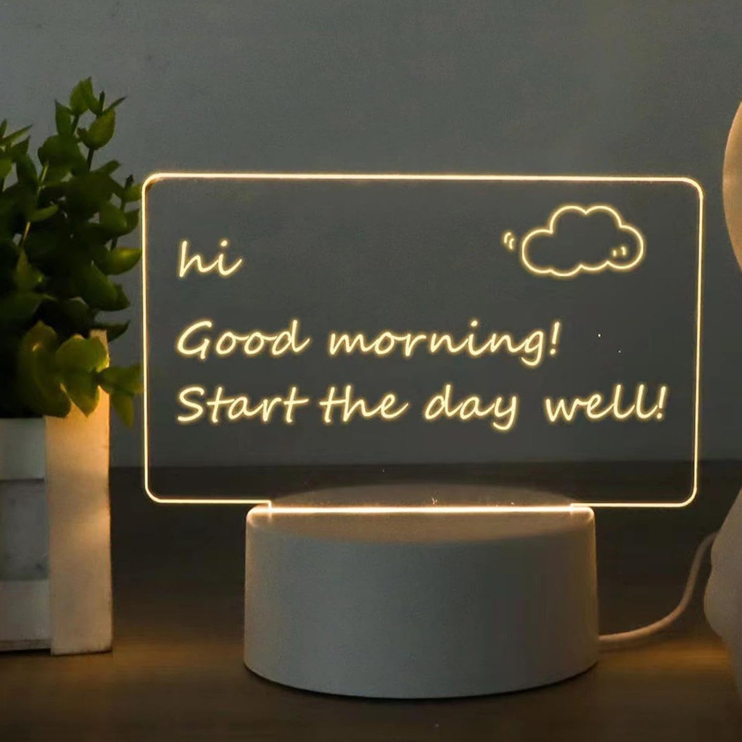 LED night lamp with writable acrylic panel glowing softly