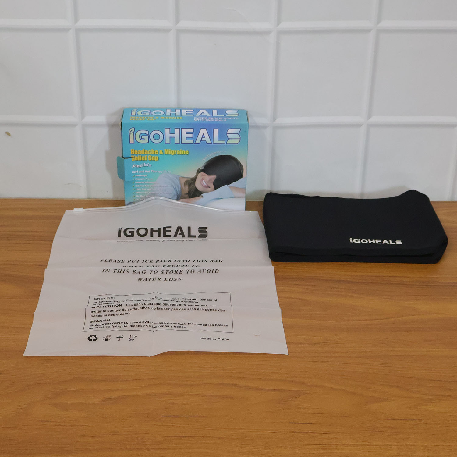 Migraine relief cap with stretchable wearable design